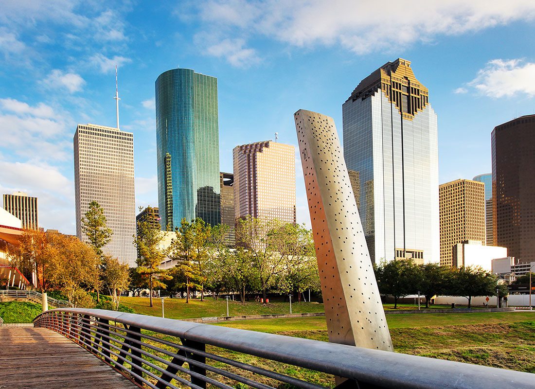 Houston, TX - Ooden Bridge in Buffalo Bayou Park With a Beautiful View of Downtown Houston